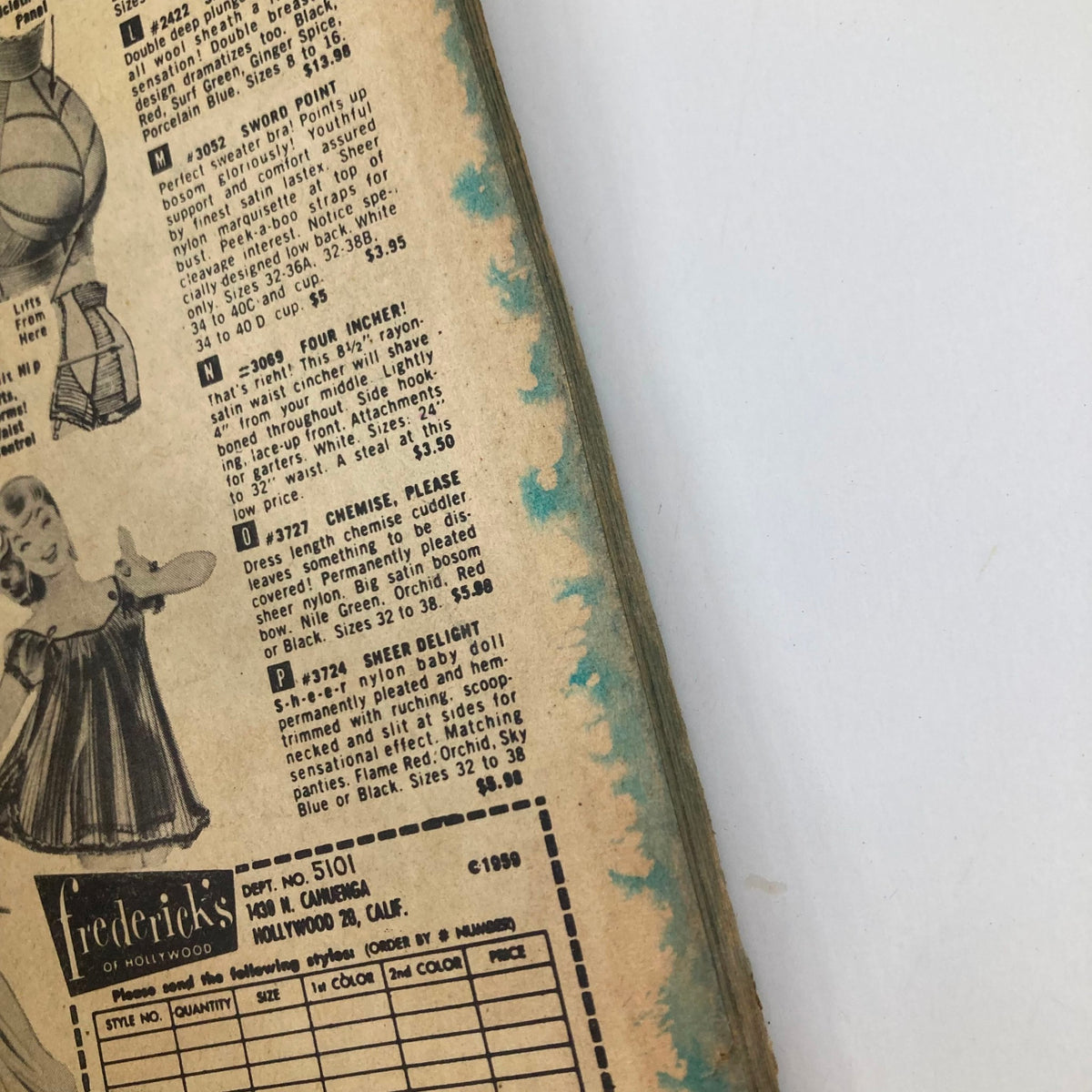 Close-up detail of VTG Real Secrets Magazine February 1960, showcasing vintage fashion advertisements and magazine layout, capturing the essence of retro print media.