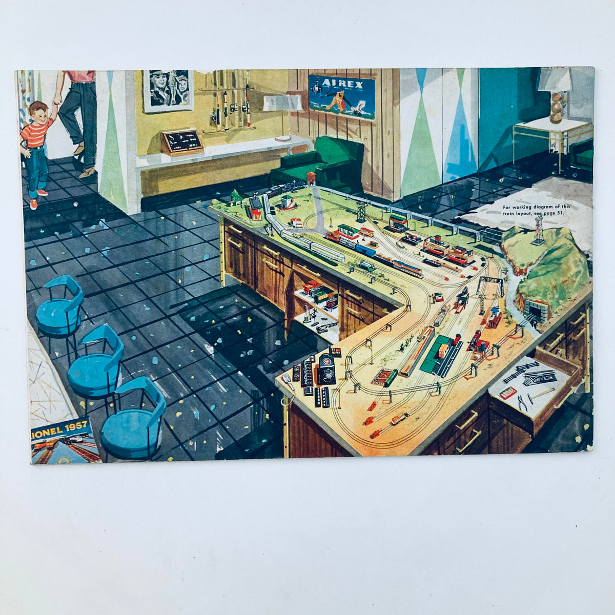 A colorful 1957 Lionel Trains catalog image depicting a model train layout setup in a home environment, featuring various train cars and accessories.
