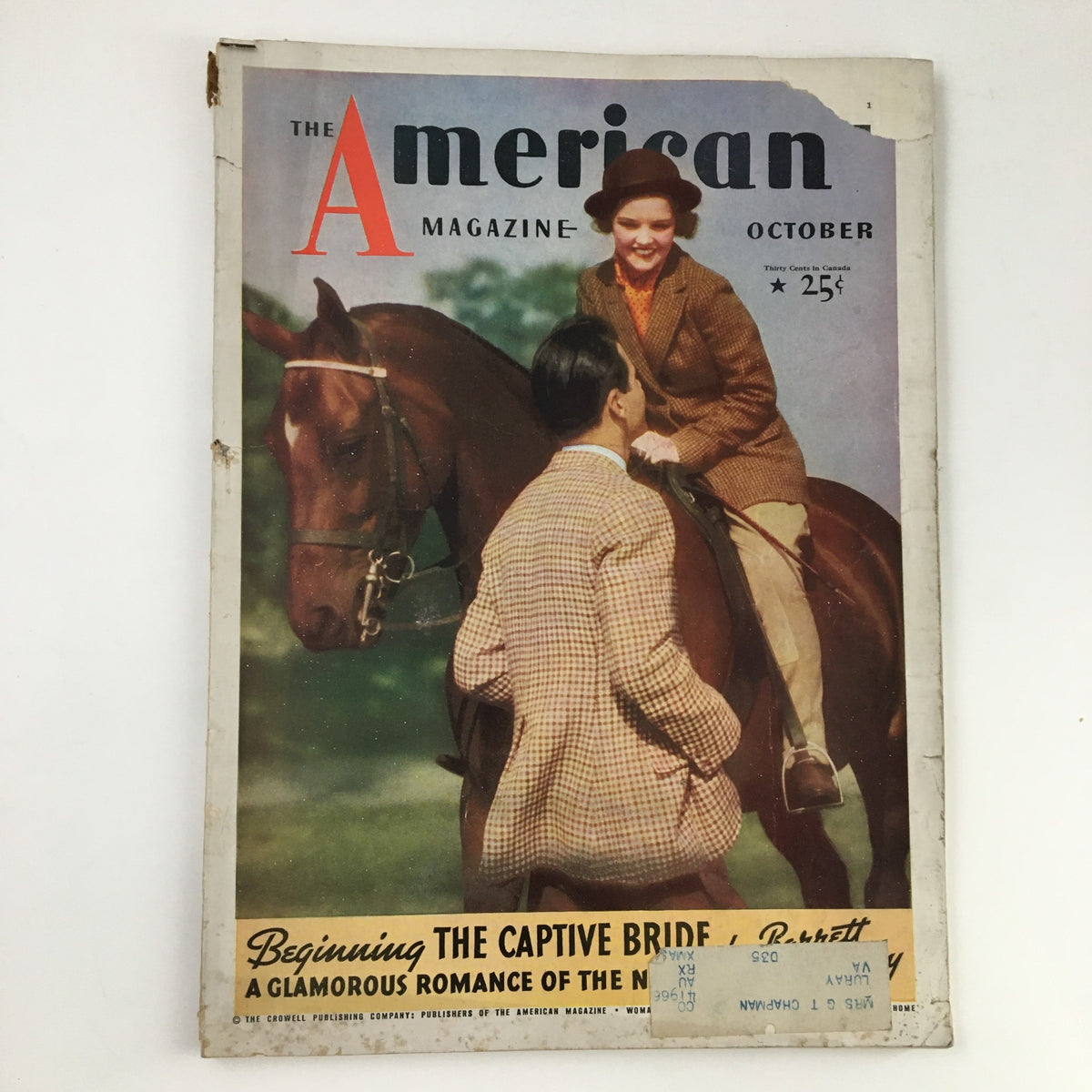 Cover of VTG The American Magazine October 1935 showing the title and an illustration related to The Captive Bride Part I by Barrett W.