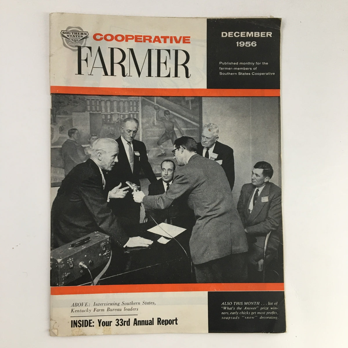 Cover of Cooperative Farmer Magazine December 1956 featuring a meeting of agricultural leaders from Southern States, showcasing cooperative farming initiatives.