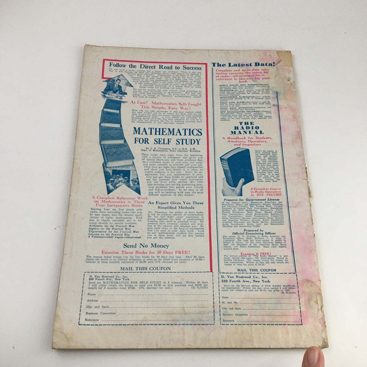 Back cover of the Radio News Magazine November 1931 featuring advertisements related to mathematics education and radio manuals.