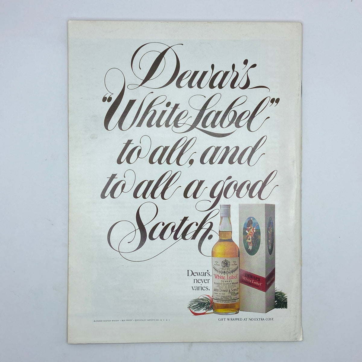 Advertisement page for Dewar's White Label Scotch from The New Yorker magazine, December 26, 1977, showcasing elegant typography and a bottle of scotch.
