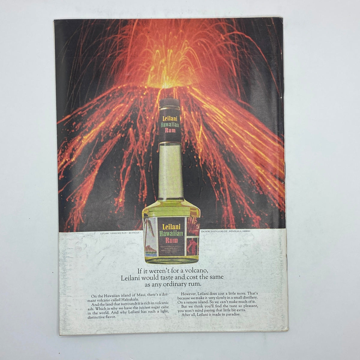 Leilani Hawaiian Rum advertisement from the July 26, 1969 edition of The New Yorker, depicting a volcanic eruption background emphasizing the uniqueness of the rum's flavor.
