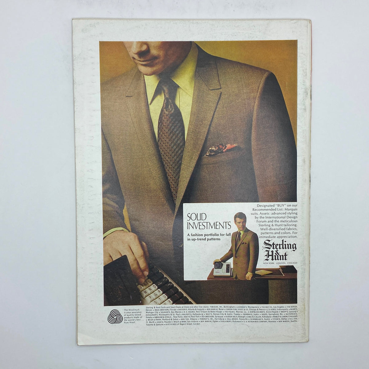 Back cover advertisement of The New Yorker magazine August 9, 1969, showcasing a tailored men's suit with a model and text promoting a fashion portfolio.