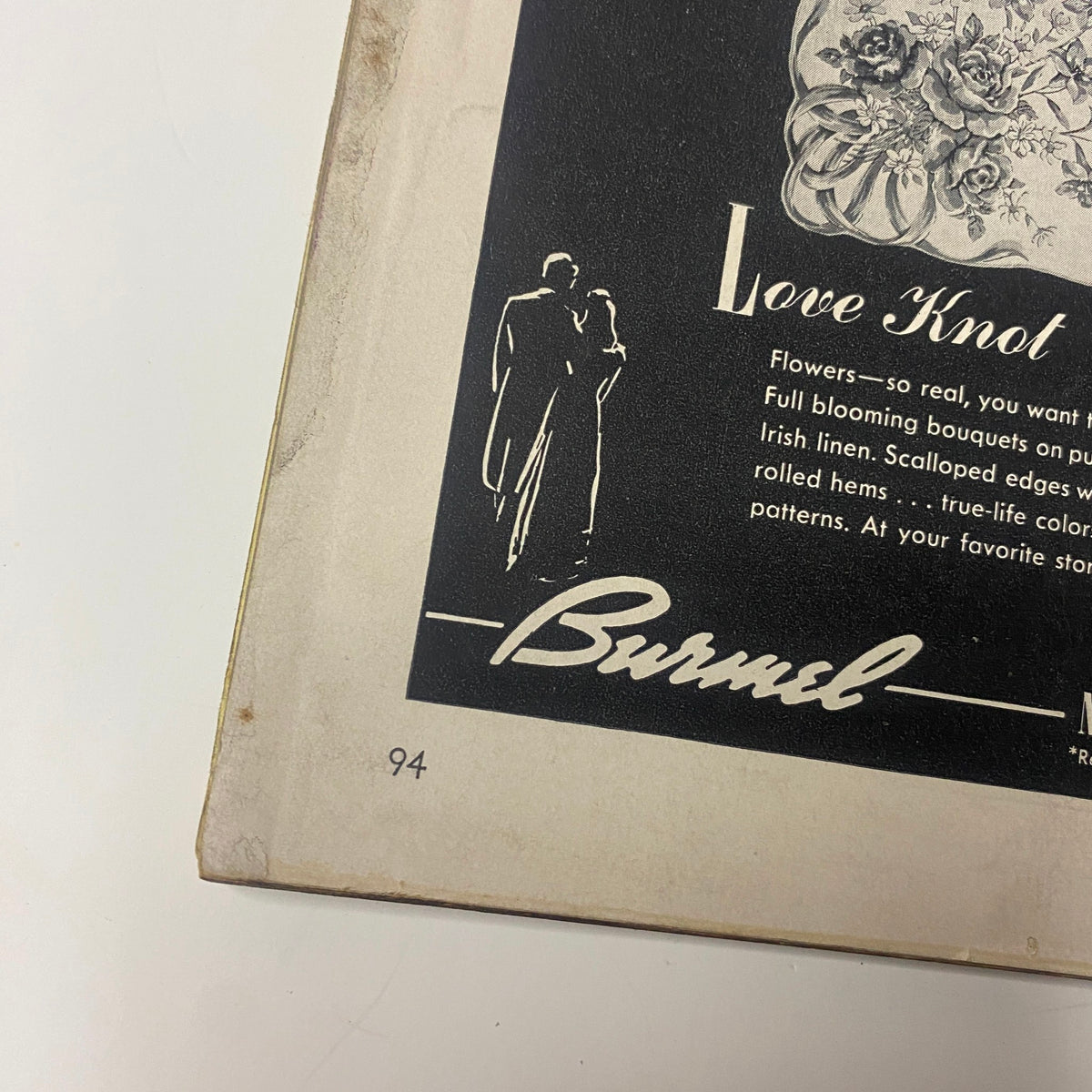 Back cover detail of Vogue Magazine June 1, 1942 displaying an advertisement for Burnel, featuring an elegant couple.