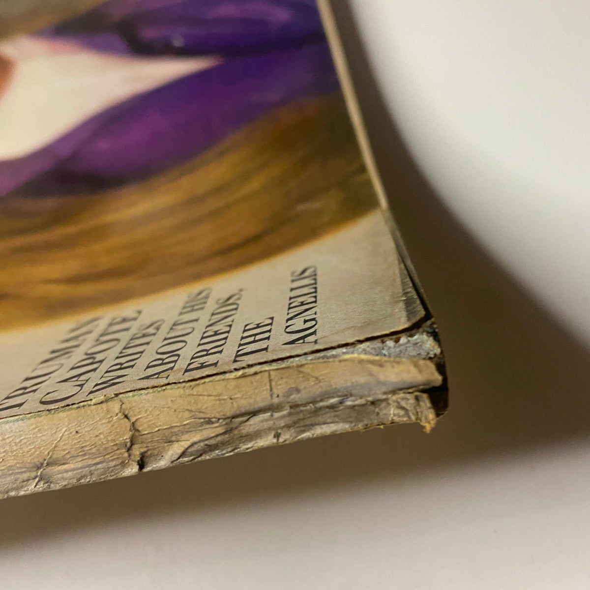 Vogue Magazine April 1, 1969 Suzy Kendall Cover by David Bailey, featuring a close-up view of the corner of the magazine showing wear and vintage characteristics.