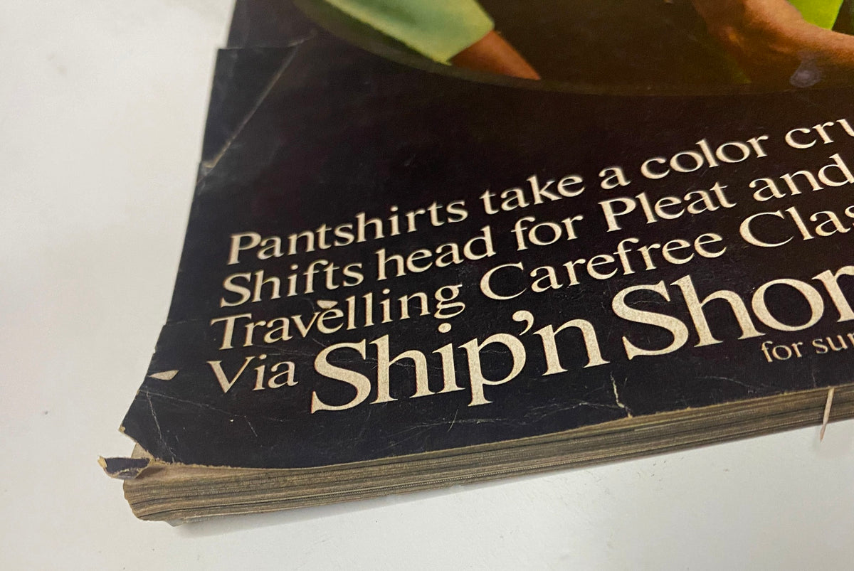 Close-up of the cover of Vogue Magazine January 1, 1968, showing wear and tear, featuring the bold typography and vintage aesthetic of 1960s fashion advertisements.