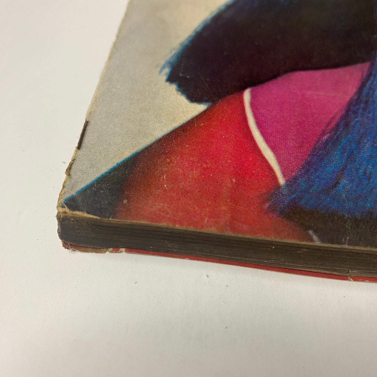 Close-up of the spine of Vogue Magazine November 1, 1966, illustrating slight wear typical of vintage magazines.