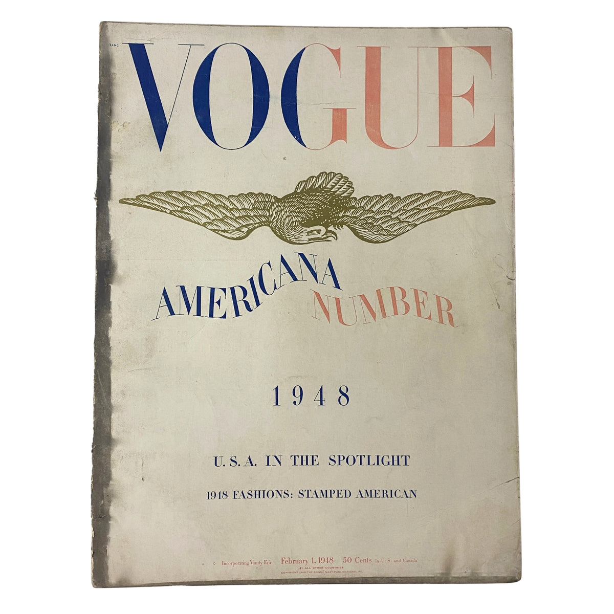 Cover of Vogue Magazine February 1, 1948 Americana Number with eagle graphic and text 'U.S.A. in the Spotlight' and '1948 Fashions: Stamped American'.