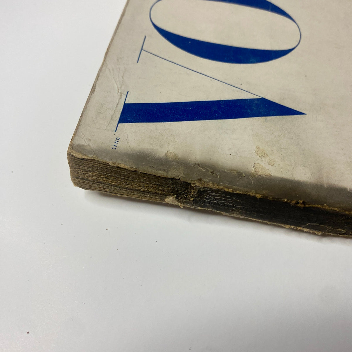 Side view showing the spine of the Vogue Magazine February 1, 1948 Americana Number, highlighting wear and age of the magazine.