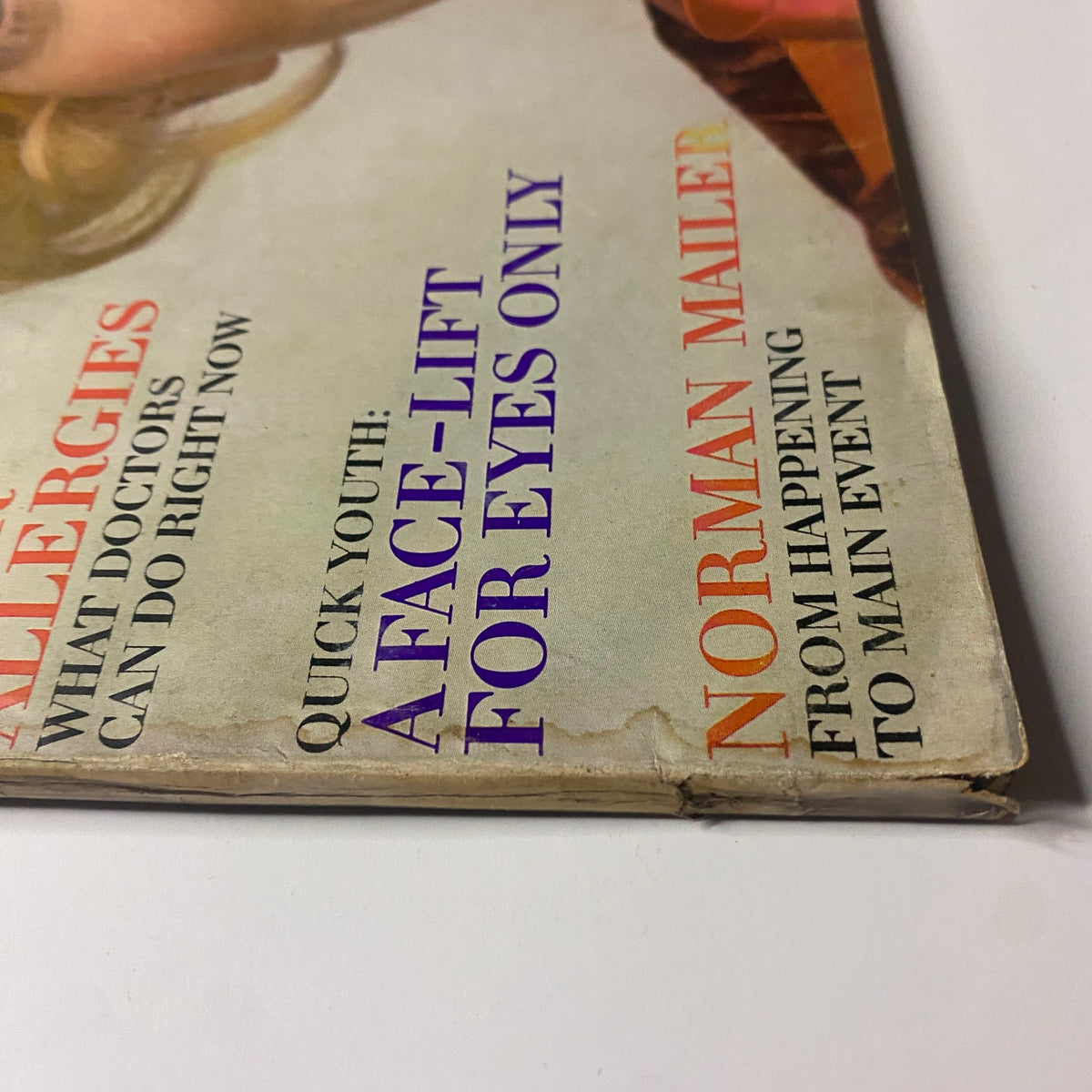 Detail shot of the cover of Vogue Magazine August 15, 1969, showcasing promotional text for articles including health tips and celebrity features.