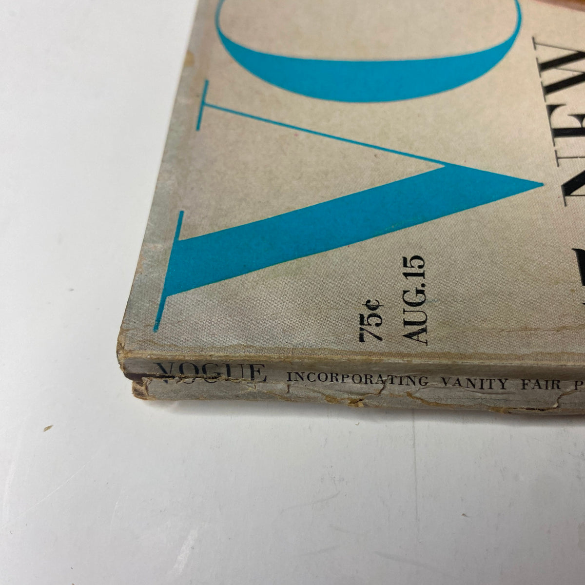 Side view of Vogue Magazine August 15, 1967 showing the publication date and details. This angle reveals the magazine's spine and highlights its vintage condition.