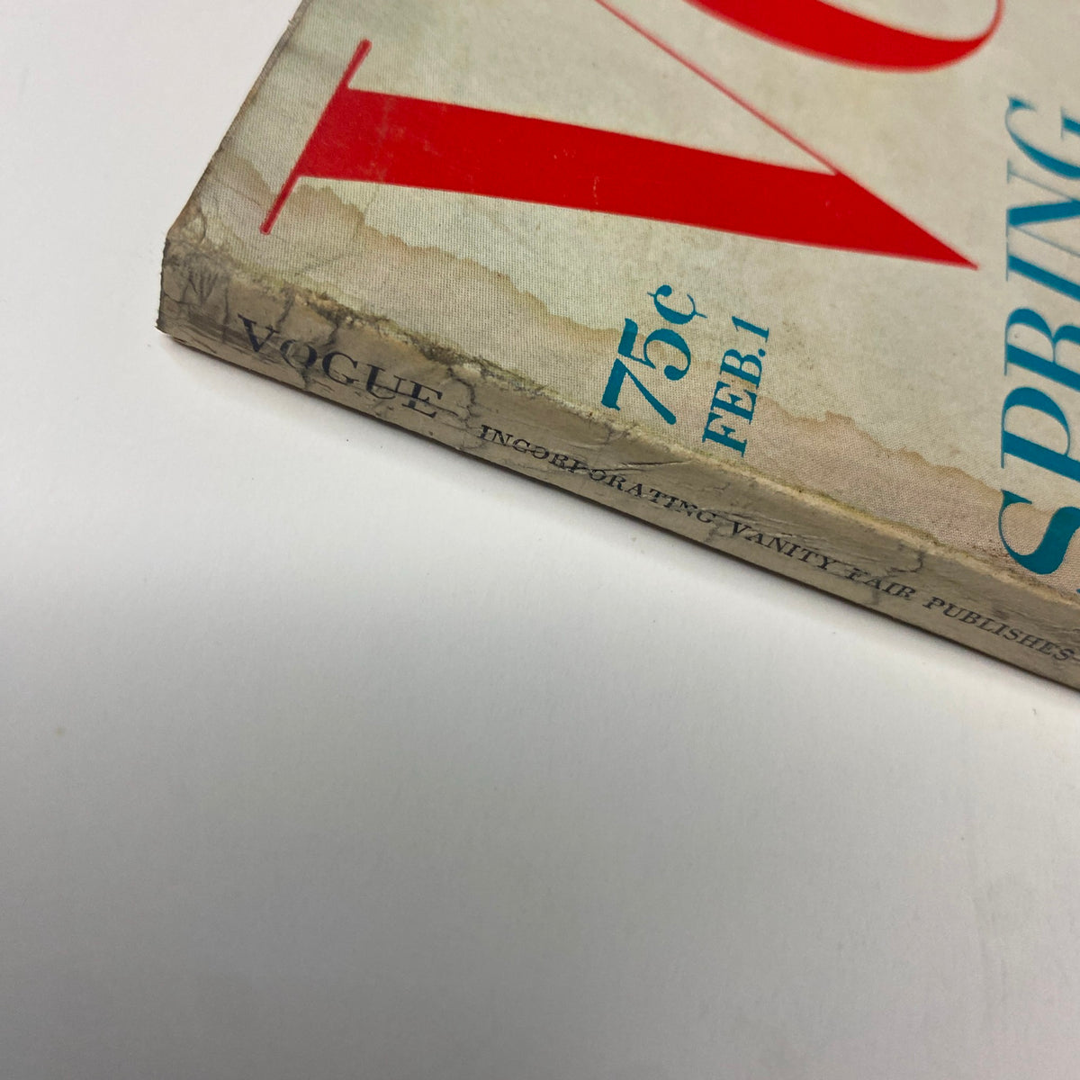 Spine detail of Vogue Magazine February 1, 1969, illustrating the vintage characteristics of the issue, which features Candice Bergen on the cover.