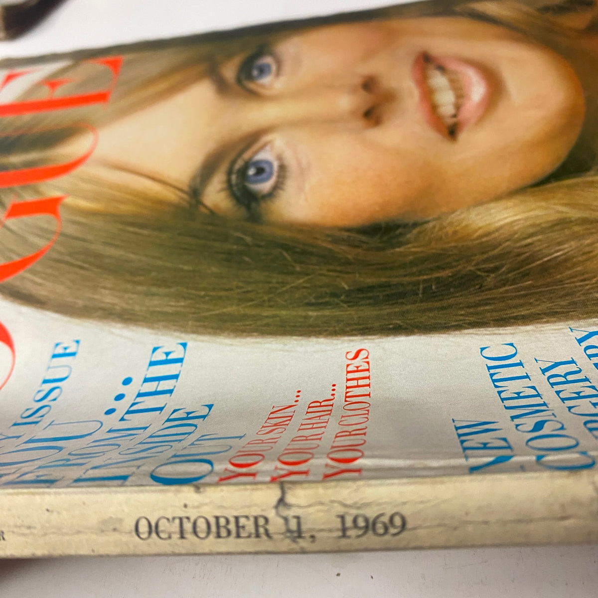 Side view of Vogue Magazine October 1, 1969 Jean Shrimpton Cover by Bert Stern, emphasizing the magazine's title and date along with the classic styling of the cover, indicative of its era.