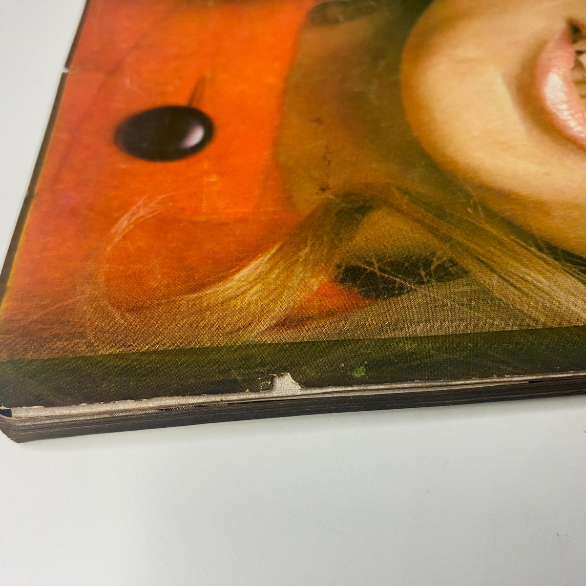 Close-up of the corner of the Vogue Magazine October 1, 1969 featuring Jean Shrimpton on the cover, showing vintage wear and preservation details.