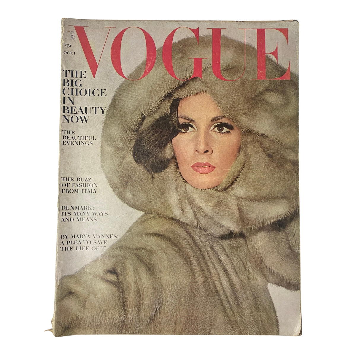 Cover of Vogue Magazine October 1, 1964 featuring Wilhelmina Cooper in luxurious fur attire, showcasing mid-1960s fashion and beauty trends.
