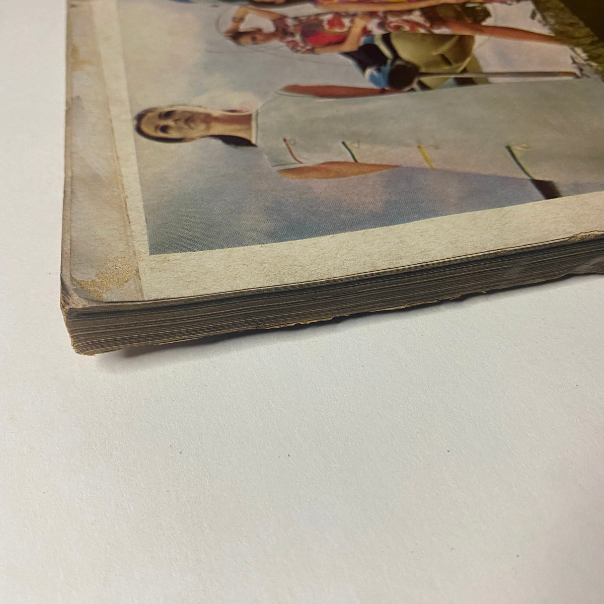 Side view of the February 1, 1968 Vogue Magazine featuring Jean Shrimpton on the cover, showcasing vintage paper quality and aged edges, emphasizing its collectible nature.