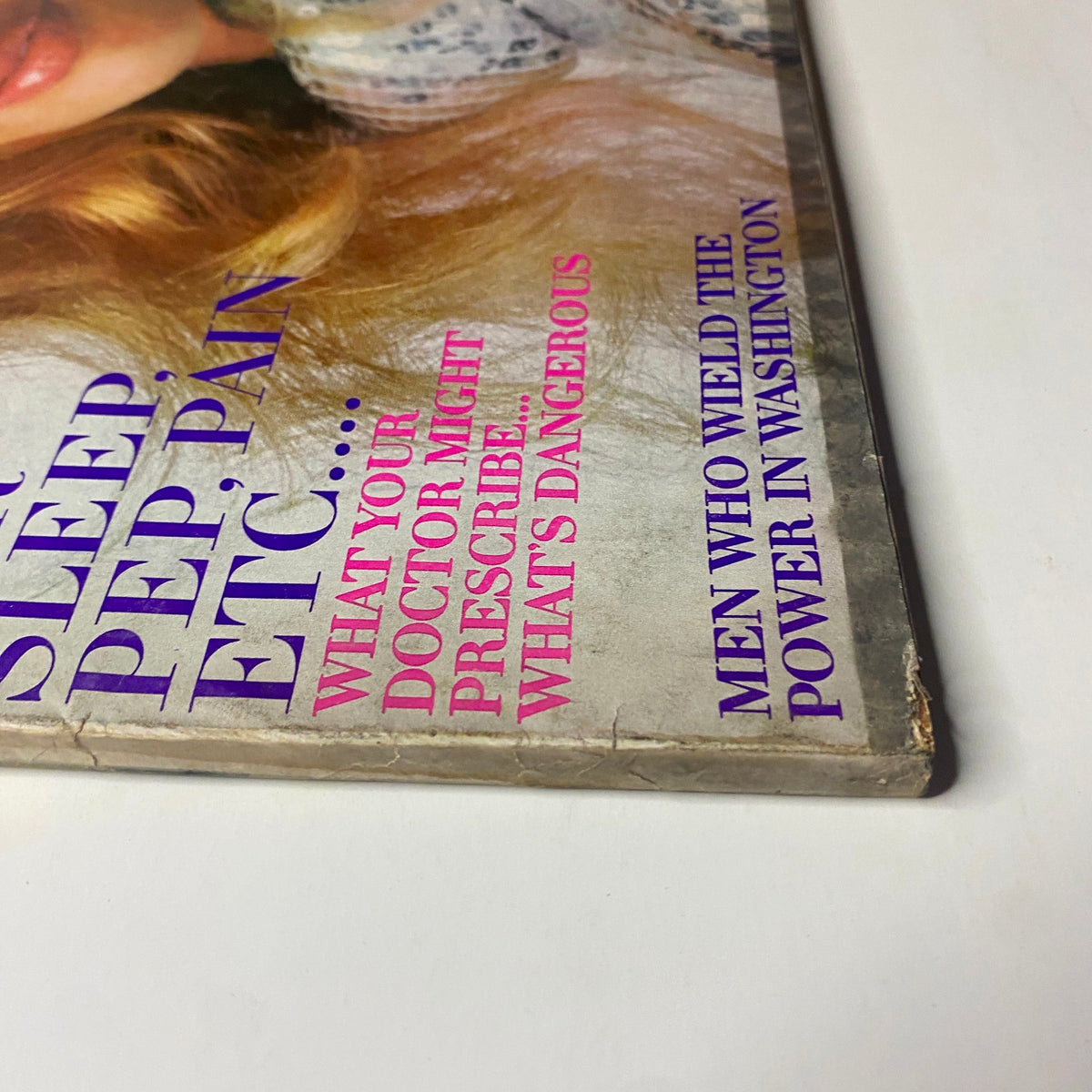 Side image of the Vogue Magazine from November 15, 1969, emphasizing the vintage title and cover details, offering a glimpse into the publication's design elements.
