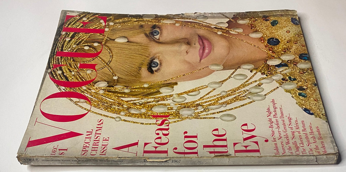 Vogue Magazine December 1967 Jean Shrimpton Cover by Irving Penn, displaying a stunning portrait of a model in a glamorous setting, promoting the theme 'A Feast for the Eye' in this vintage fashion magazine.