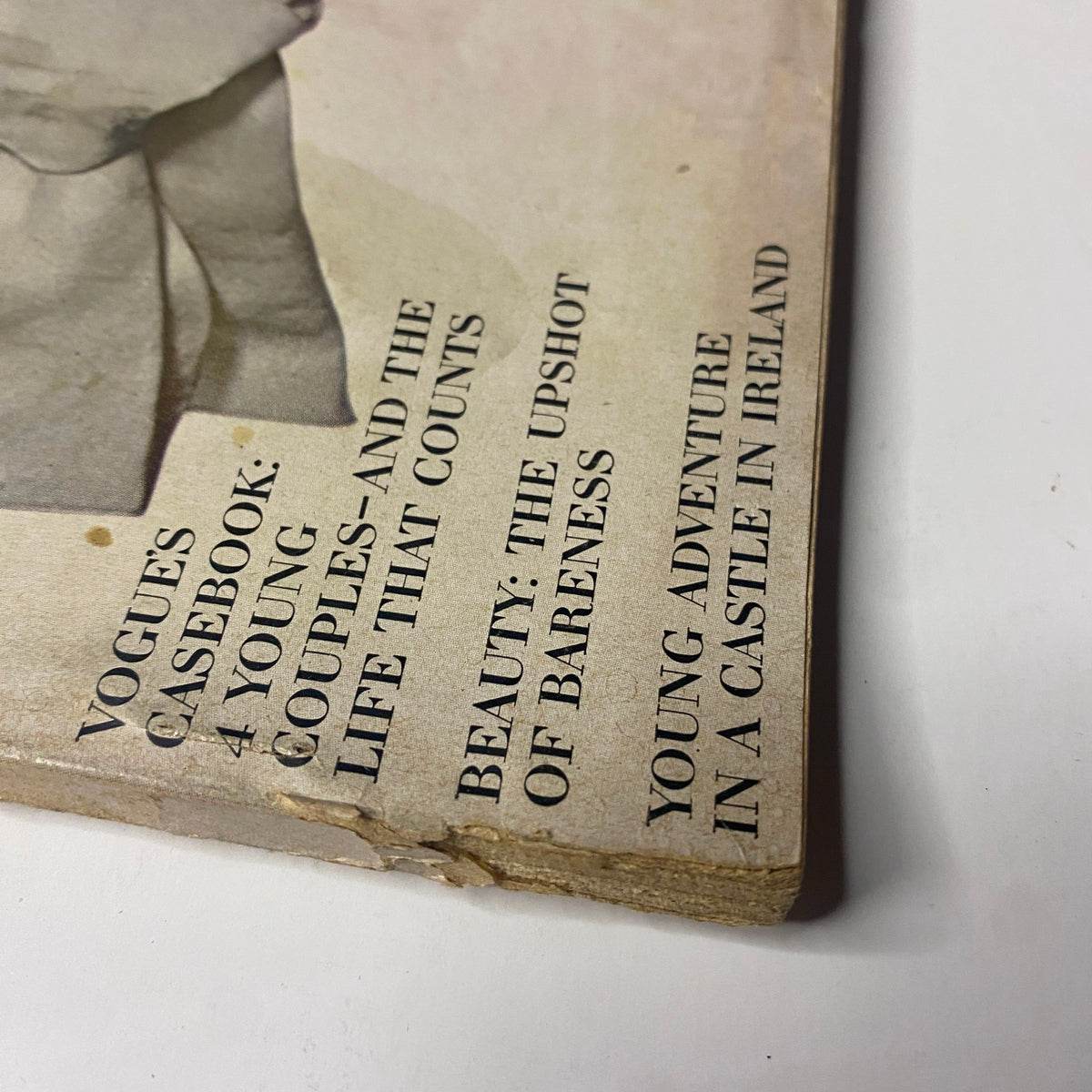Detail of the back cover of Vogue Magazine November 15, 1964, featuring the contents list and vintage advertisements.