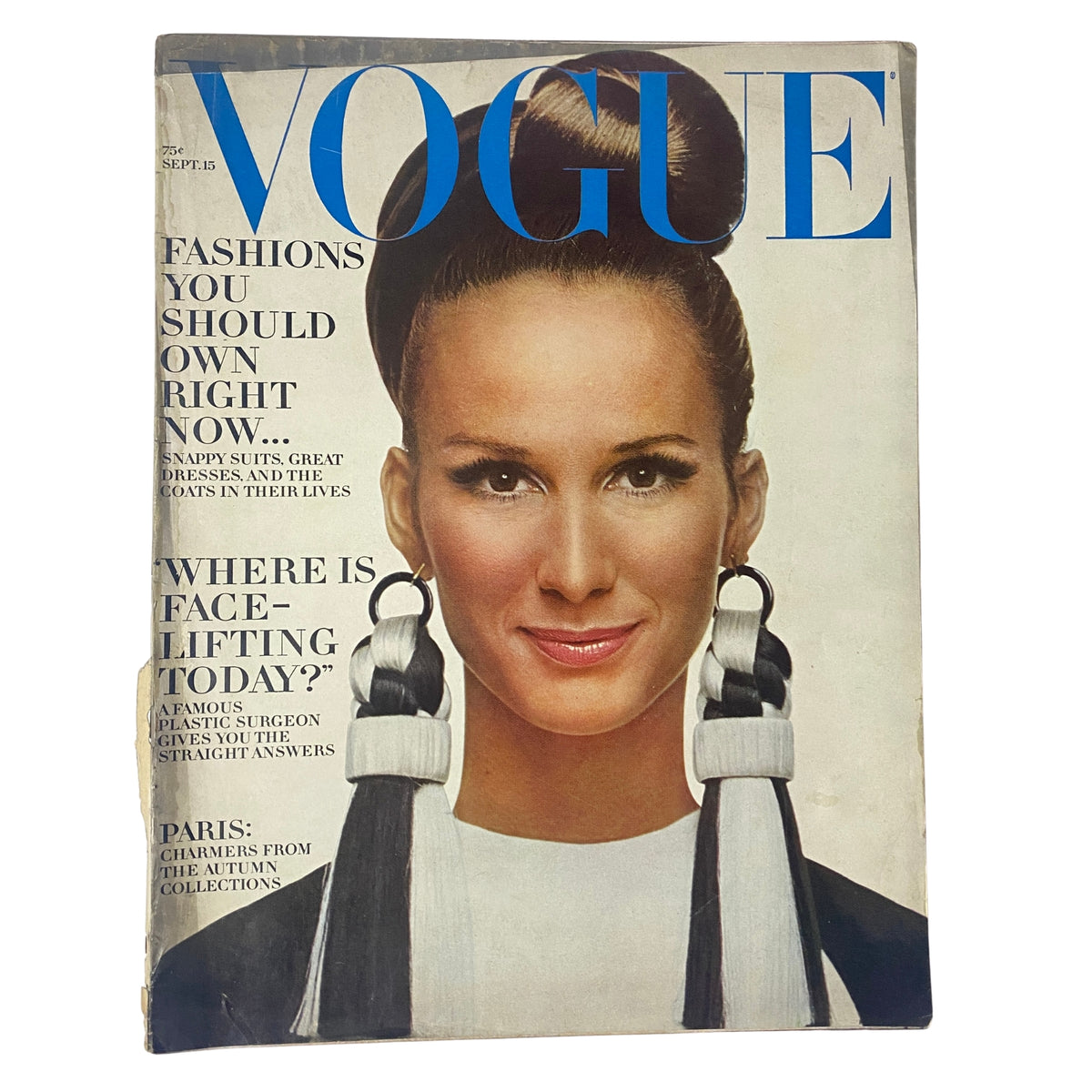 Vogue Magazine September 15, 1966 featuring Brigitte Bauer on the cover, photographed by Richard Avedon. The magazine showcases a modern fashion aesthetic with bold typography.