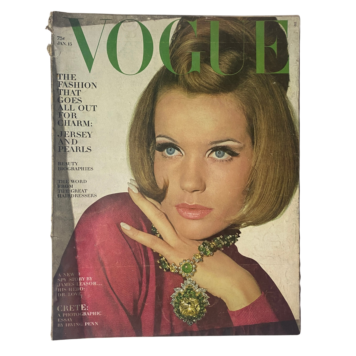 Vogue Magazine January 15, 1965 featuring a stunning cover image of model Veruschka, photographed by Irving Penn. The magazine showcases fashion themes including jersey and pearls, adorned with vintage aesthetics indicative of mid-1960s style.