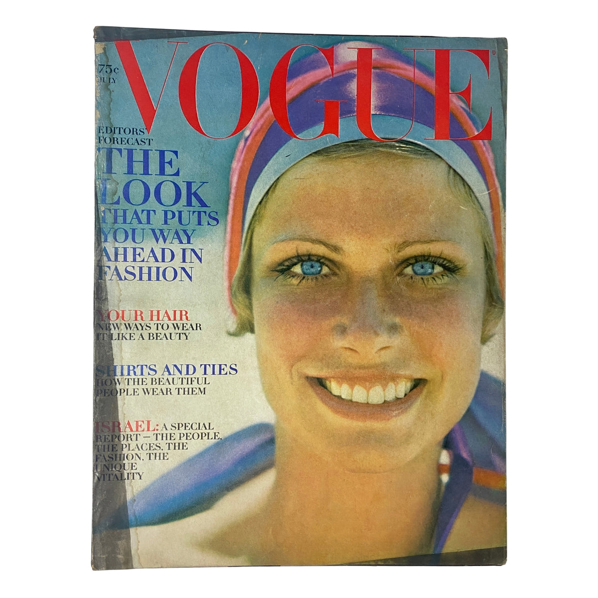 Vogue Magazine July 1969 cover featuring Susanne Schöneborn, photographed by John Cowan, showcasing vibrant colors and a fashion-forward aesthetic.