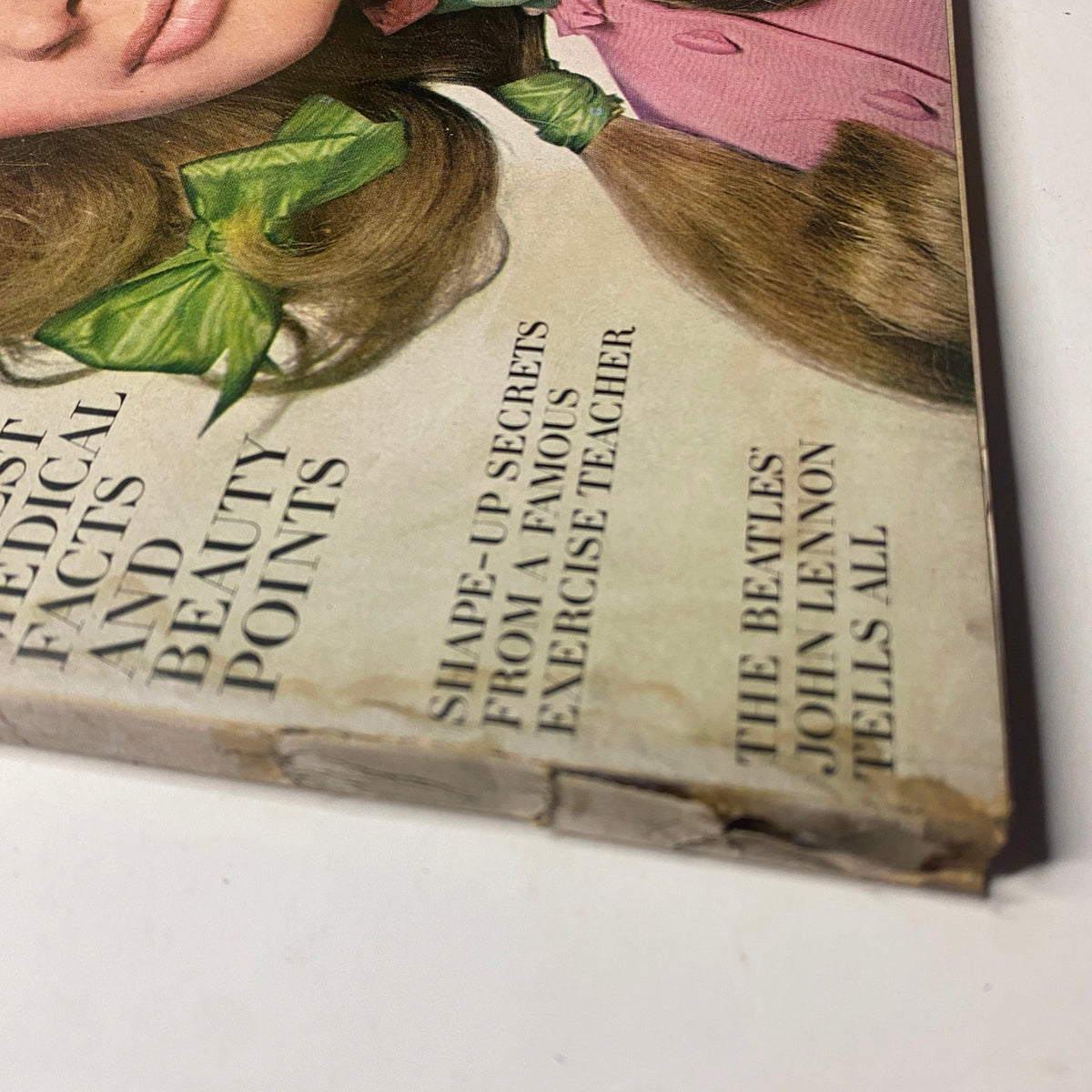 Detailed view of the cover of Vogue Magazine March 1, 1969, highlighting design elements and showcasing Sue Murray's glamorous look.