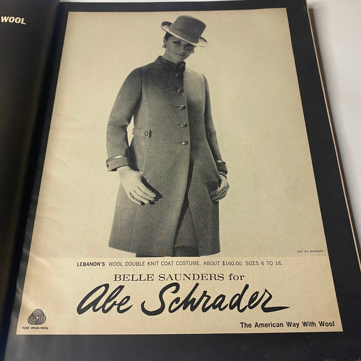 Vogue Magazine July 1968 advertisement featuring model in a Belle Saunders coat, promoting Abe Schrader's wool coat collection.