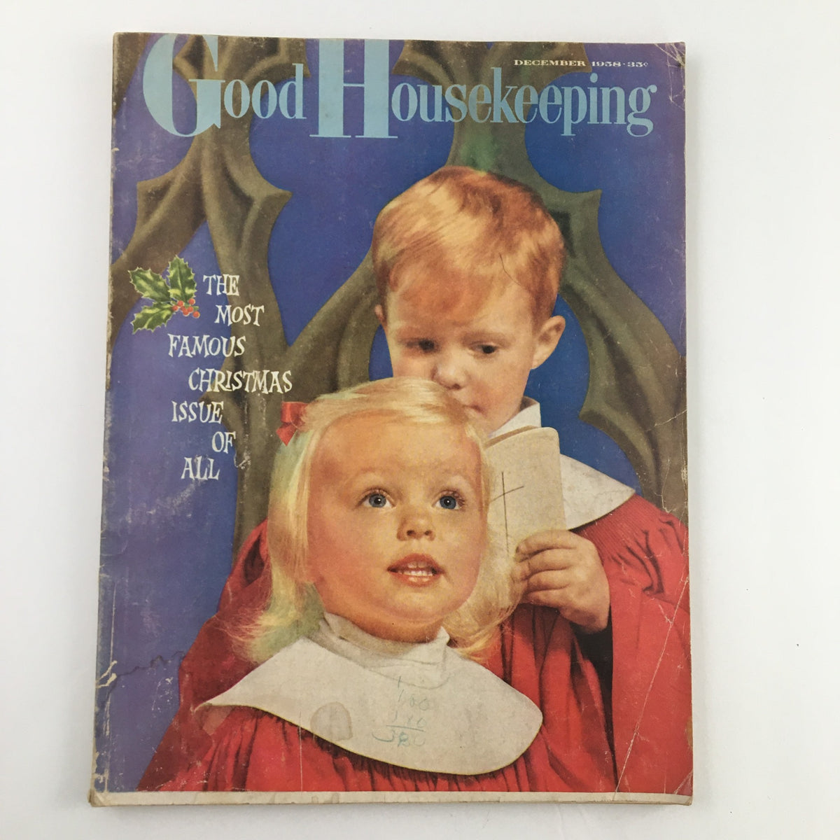 Cover of Good Housekeeping Magazine from December 1958, featuring children in choir attire, celebrating the theme 'First Christmas Away From Home'.