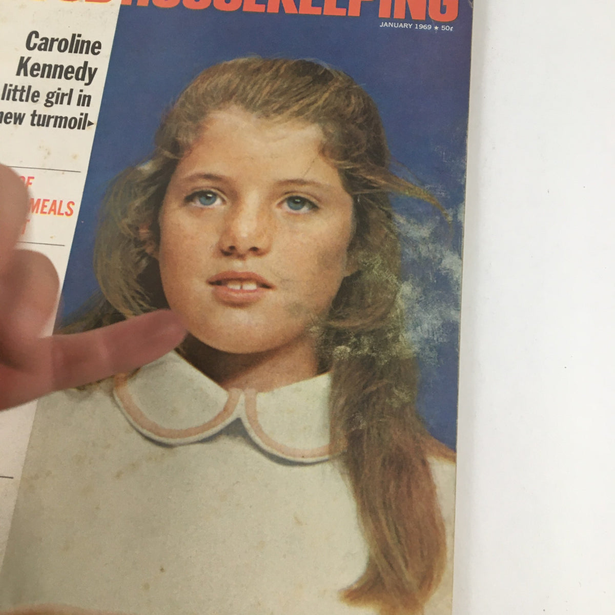 Close-up image of Good Housekeeping Magazine January 1969 cover with Caroline Kennedy, showcasing details of the magazine's articles and her expression.