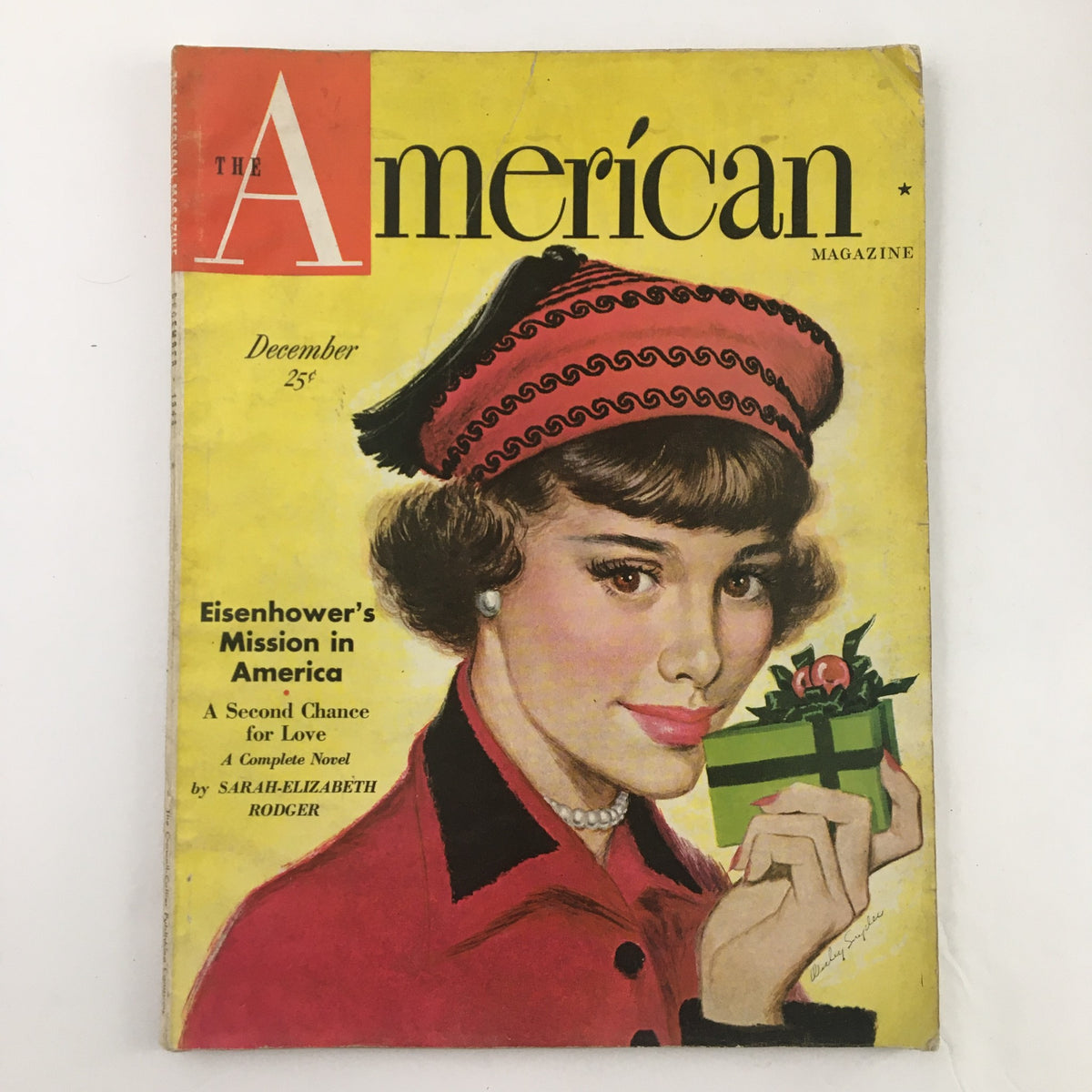 Cover of The American Magazine December 1948 featuring Eisenhower's Mission in America, showcasing a woman in a stylish dress holding a gift, set against a bright yellow background.