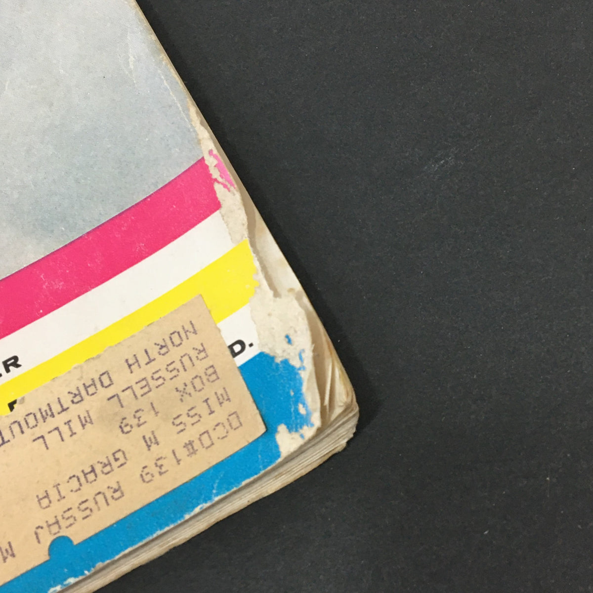 Bottom edge view of VTG Journal Magazine July 1959, featuring an address label and indicating signs of age with colorful margin details.