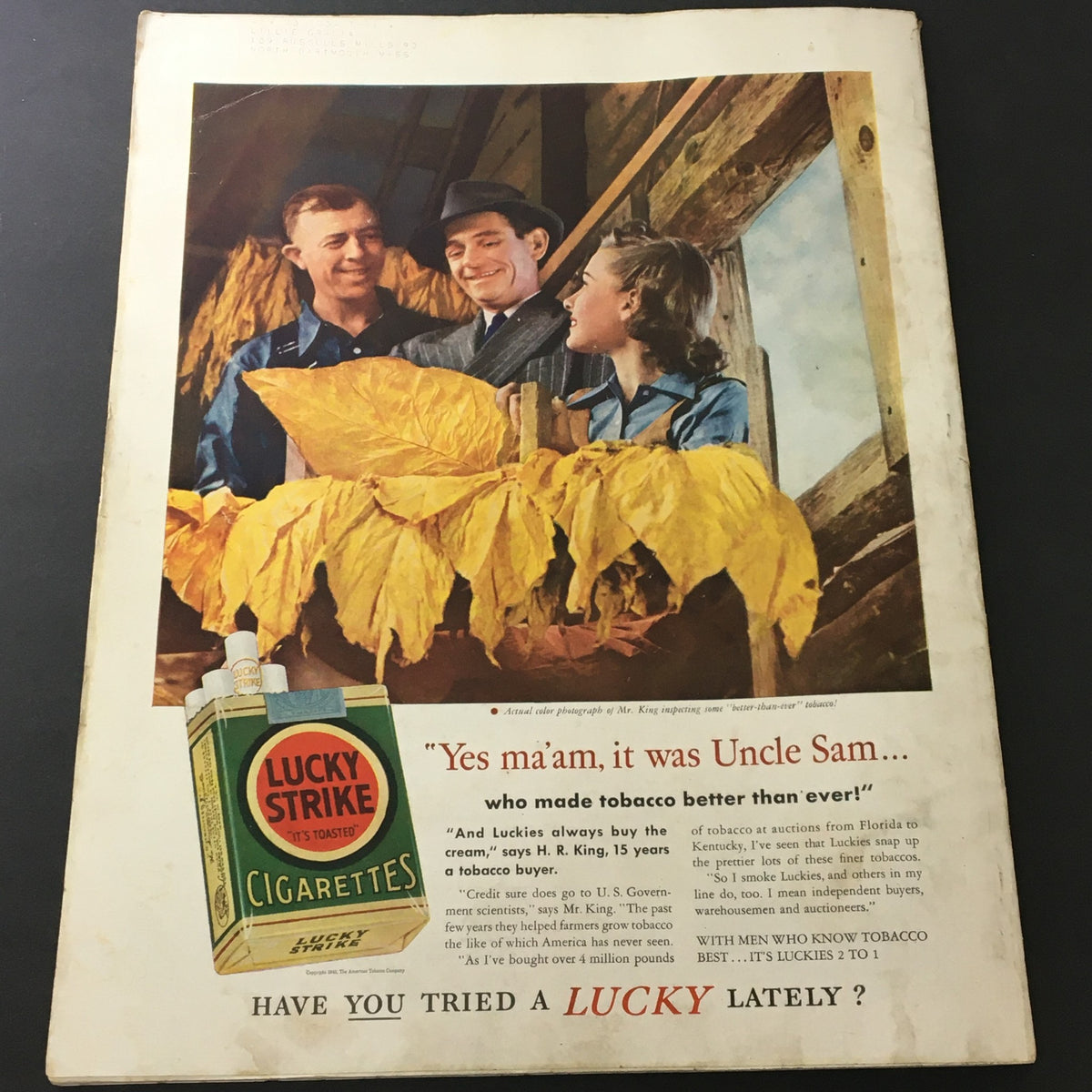 Cover of VTG Better Homes & Gardens June 1940, featuring a tobacco advertisement with three individuals discussing tobacco leaves, accompanied by a Lucky Strike cigarette pack.