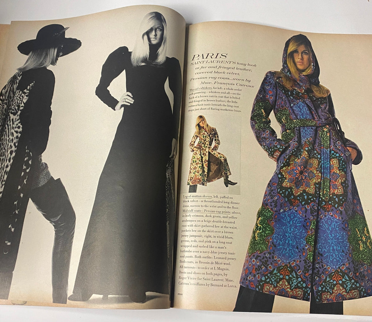 Vogue Magazine September 15, 1969 Susanne Schöneborn Cover features stunning high fashion photography showcasing a model in a black gown and a colorful patterned trench coat, highlighting the Paris fashion scene.