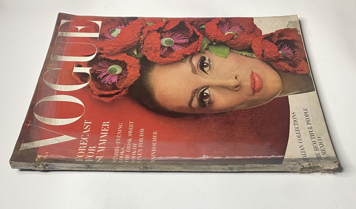 Side view of Vogue Magazine April 1, 1965 with Wilhelmina Cooper on the cover, highlighting the magazine's condition and vintage appeal.
