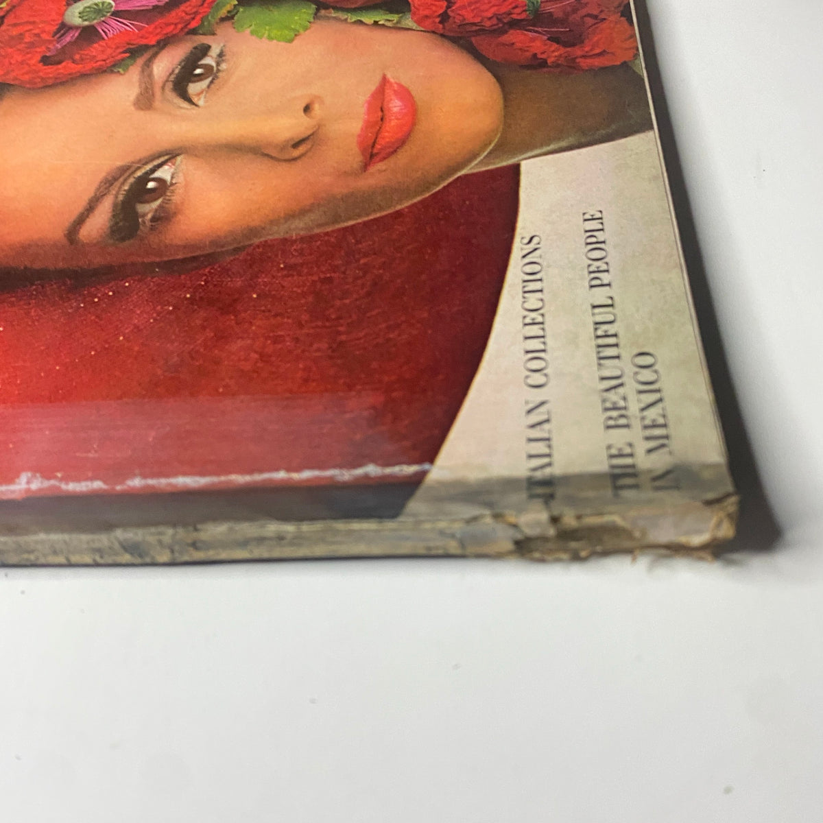 Another angle of Vogue Magazine April 1, 1965 showcasing Wilhelmina Cooper on the cover, depicting features of the magazine's outer aesthetics.