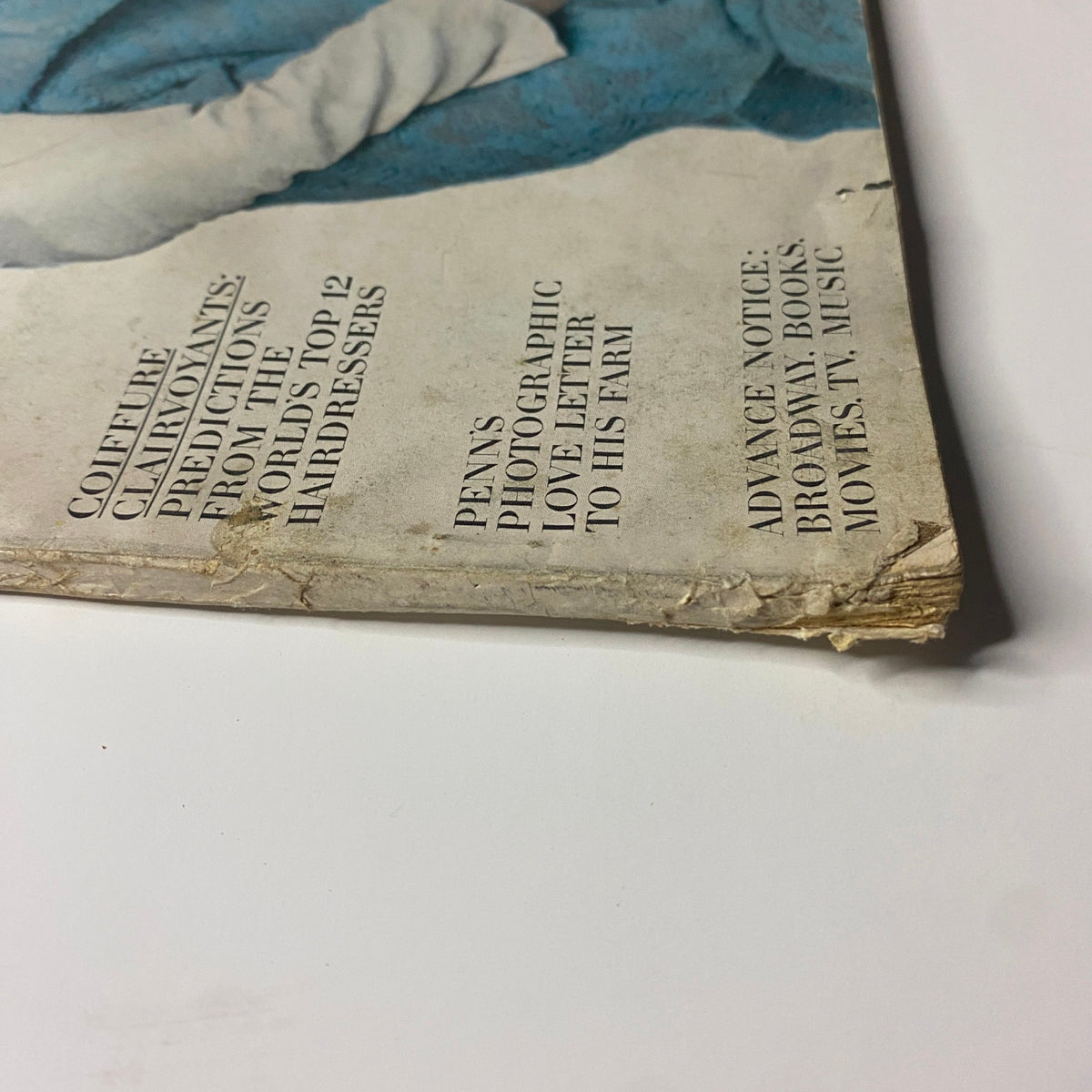 Vogue Magazine August 15, 1963 Wilhelmina Cooper Cover by Bert Stern showing the magazine's edge wear and creased spine, highlighting its vintage condition.