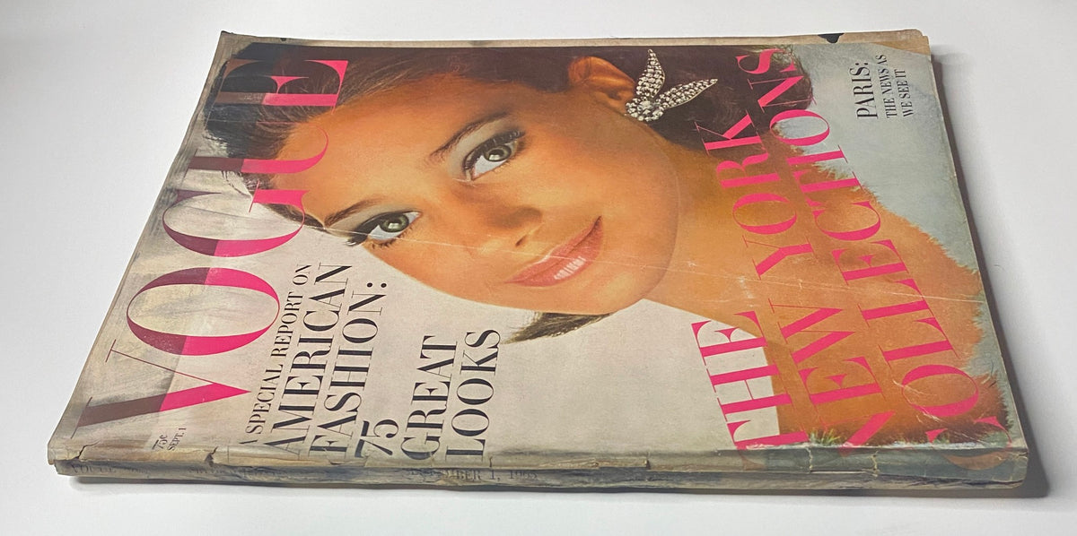 Close-up view of Vogue Magazine September 1, 1965 cover showcasing Marisa Berenson, captured by Irving Penn, with focus on American fashion and The New York Collections.