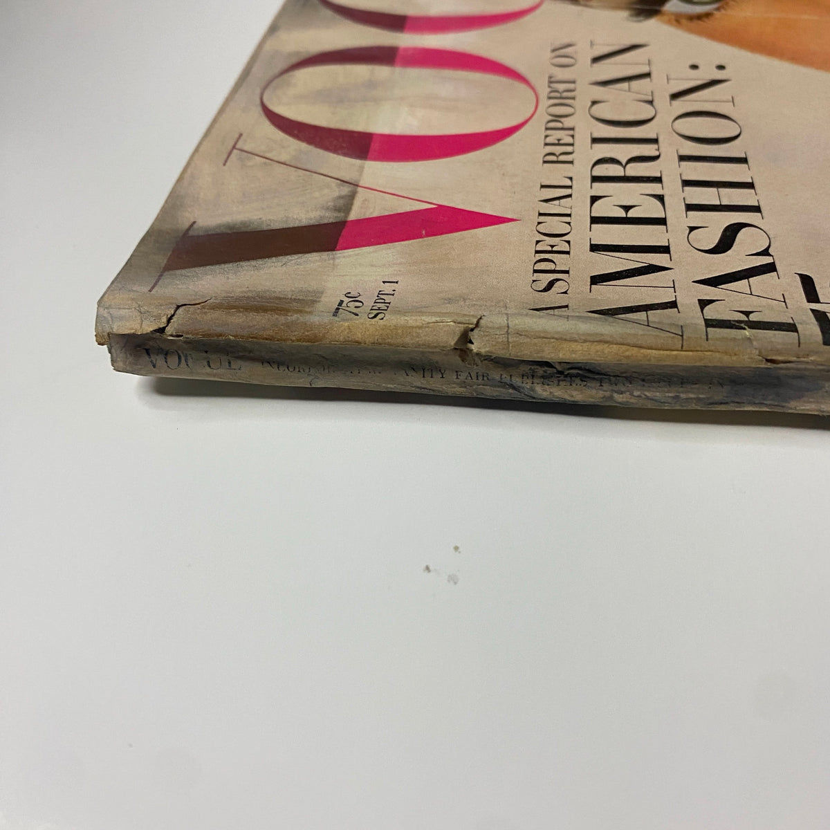 Side view of Vogue Magazine September 1, 1965 displaying binding wear, featuring Marisa Berenson and reporting on American fashion, particularly The New York Collections.