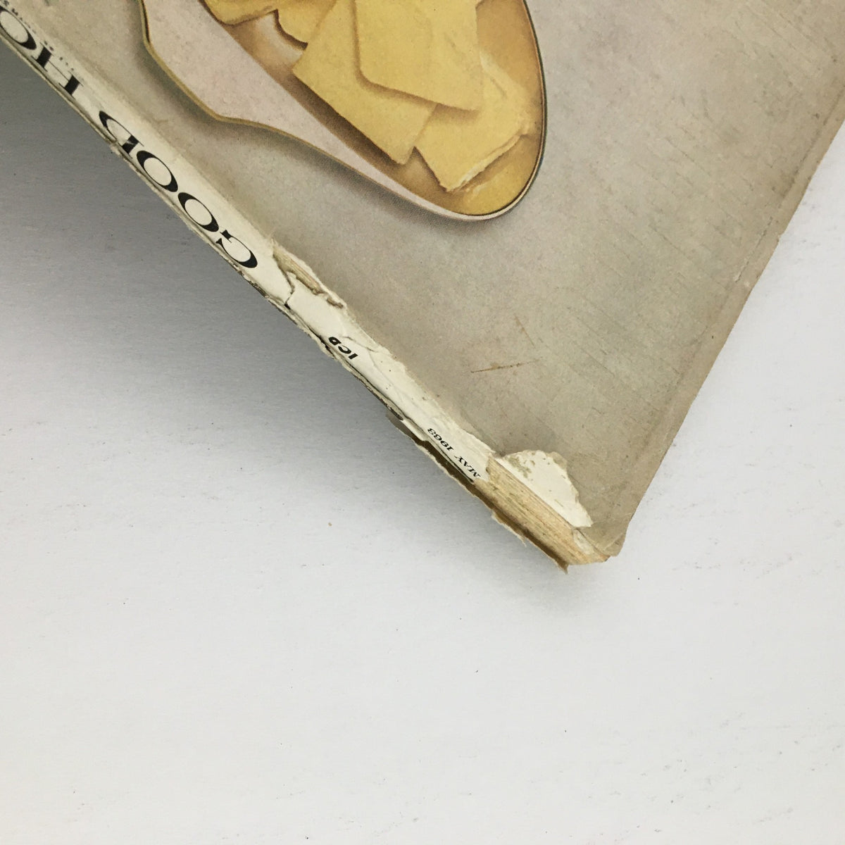 Close-up of the side cover of May 1963 Good Housekeeping Magazine, highlighting minor wear and historical value with its original design and vintage charm.