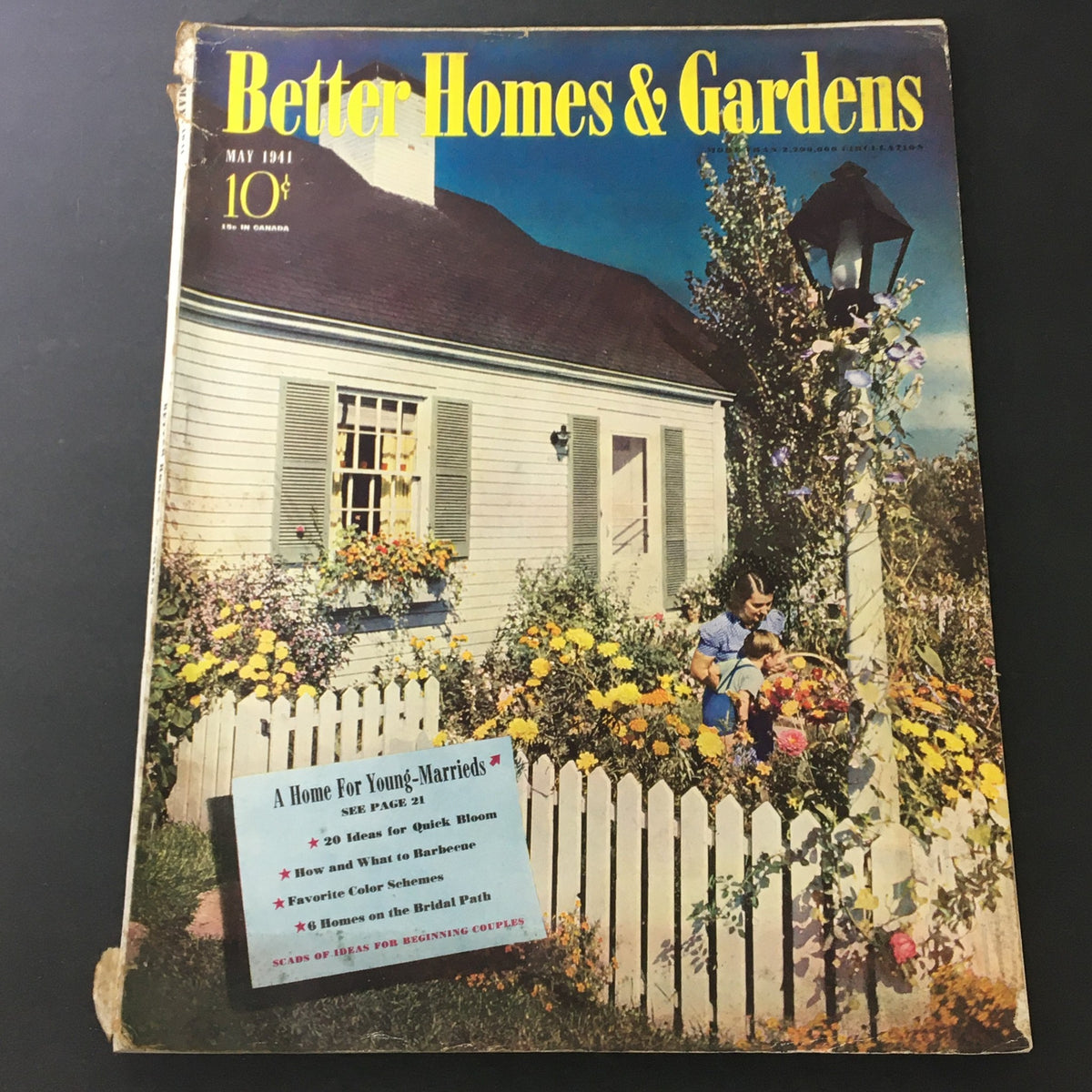 Cover of VTG Better Homes & Gardens May 1941 Extra Sparkle For Your Summer Meals showcasing a charming house surrounded by colorful flowers.