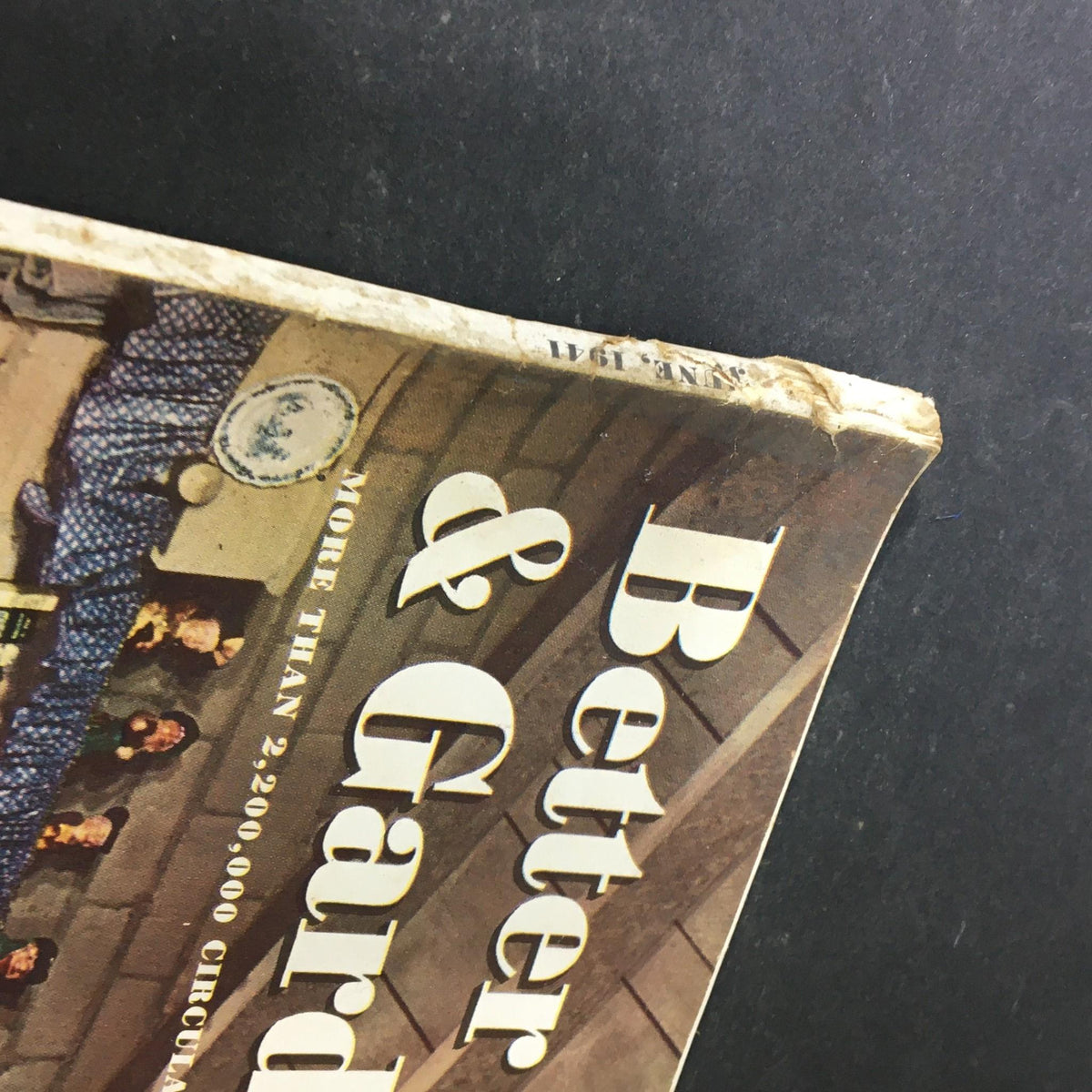 Side view of Better Homes & Gardens June 1941 magazine showing wear and tear on the spine, showcasing its vintage condition as a collectible item.