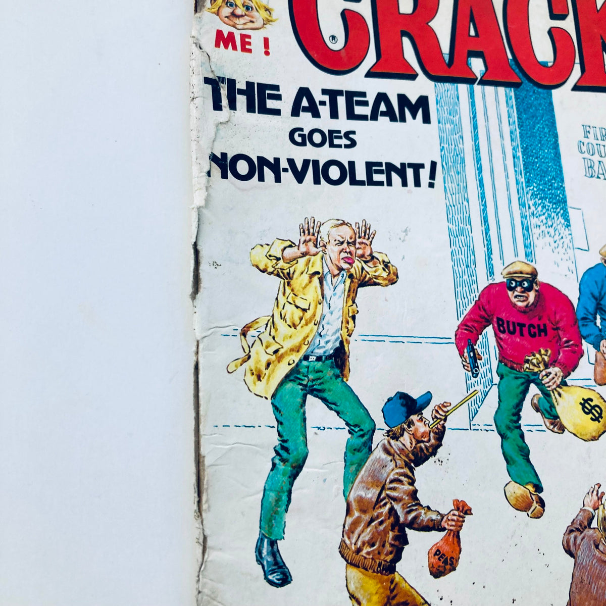 Close-up of the cover of VTG Cracked Magazine March 1985 No. 210 highlighting The A-Team with comic art, demonstrating the magazine's vintage appeal and nostalgic storytelling.
