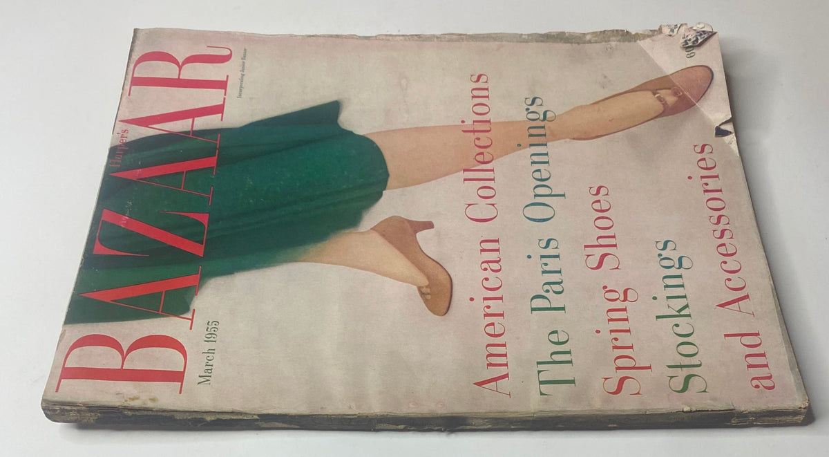 Cover of Harper's Bazaar Magazine March 1955 featuring American Collections, The Paris Openings, Spring Shoes, Stockings, and Accessories. The cover shows a model in a green skirt and ballet flats.