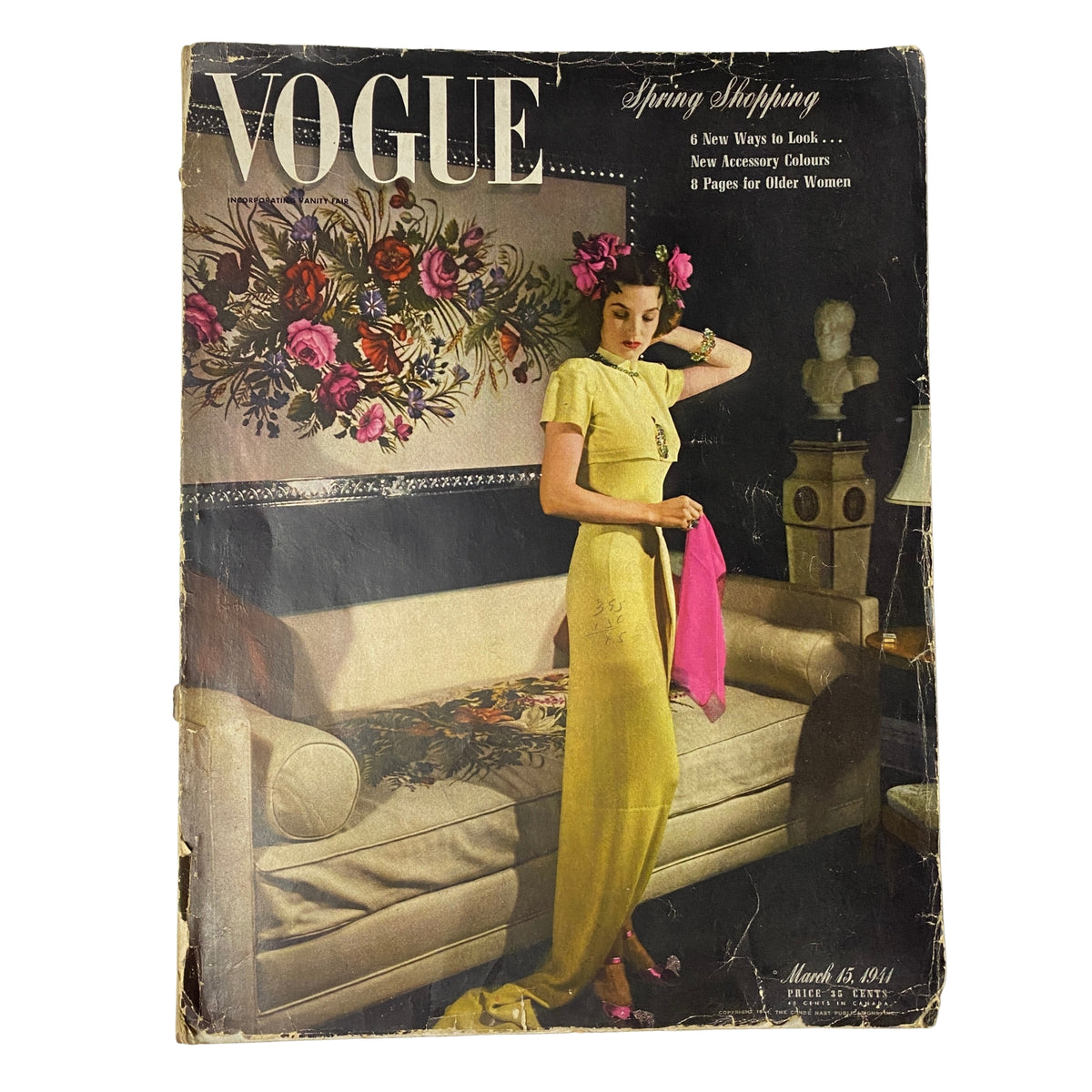 Cover of Vogue Magazine March 15, 1941 featuring Laurie Douglas in a stylish yellow dress, highlighted with vibrant flowers in the background, showcasing early 1940s fashion and design.