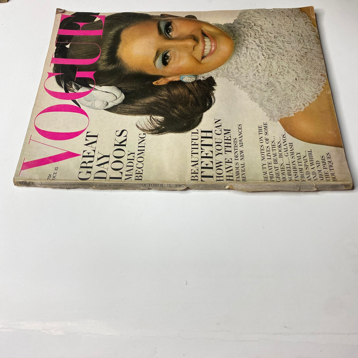Vintage Vogue Magazine cover, October 15, 1967 featuring Jennifer O'Neill, showcasing vibrant fashion and hairstyle trends.