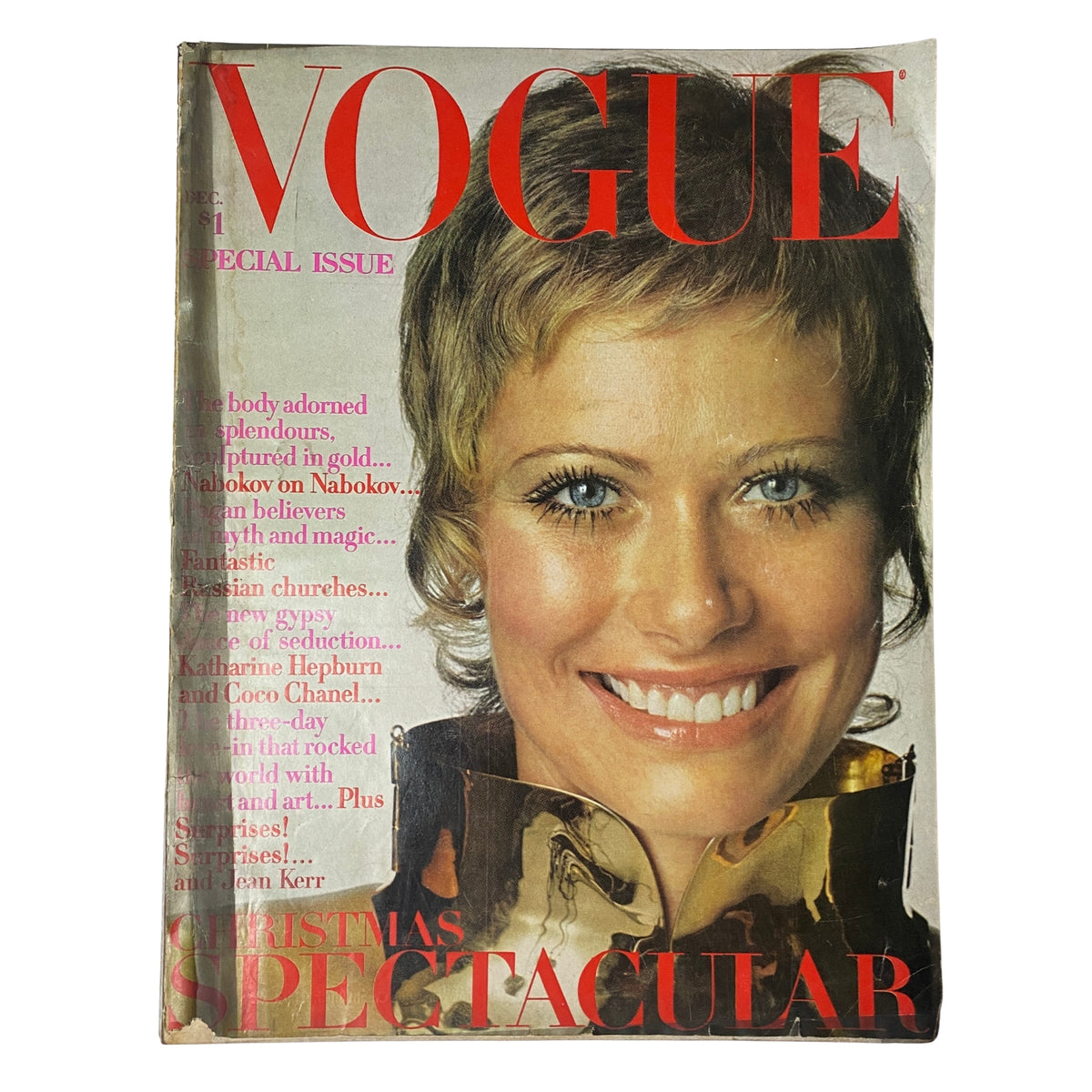 Vintage Vogue Magazine December 1969 featuring Susanne Schöneborn on the cover, photographed by Irving Penn, showcasing a unique holiday theme with a captivating portrait in a striking hairstyle and fashion.