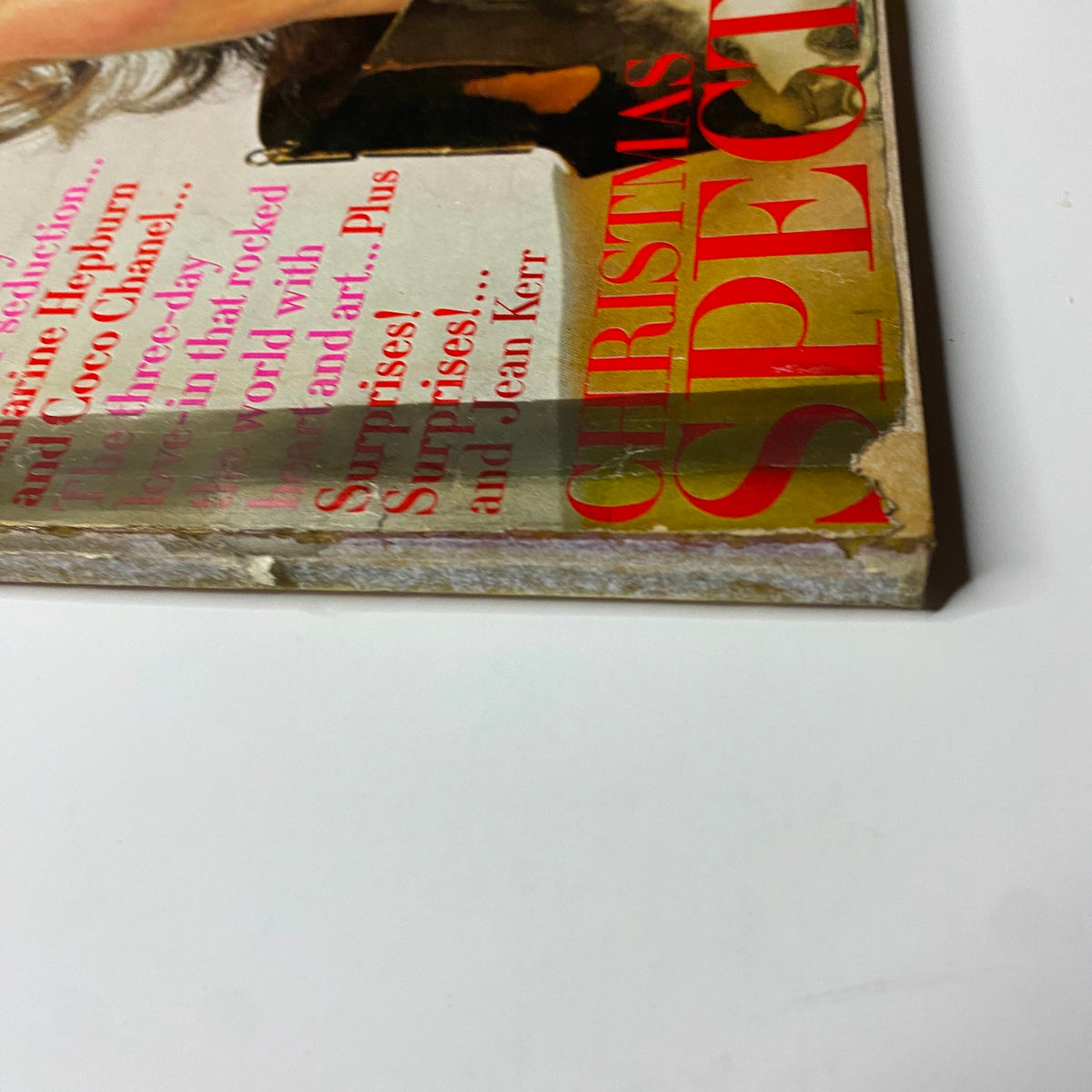 Another angle of the Vogue Magazine December 1969 cover, focusing on the top section displaying the words 'CHRISTMAS SPECTACULAR', emphasizing its iconic design and unique holiday features.