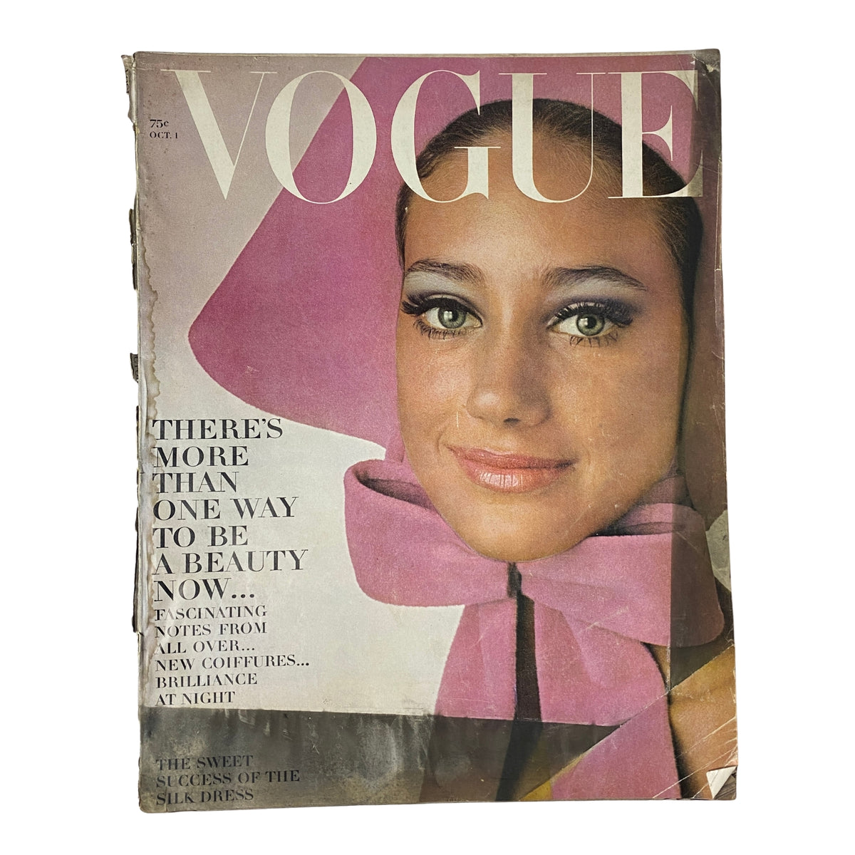 Vintage Vogue Magazine cover from October 1, 1965 featuring Marisa Berenson, photographed by Irving Penn, highlighting beauty and fashion themes.